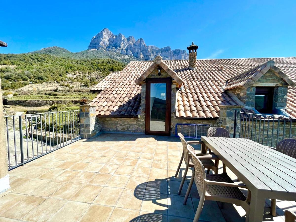 Apartamentos Bajo Pena Apartamentos Sanlorien El Pueyo de Araguas ภายนอก รูปภาพ